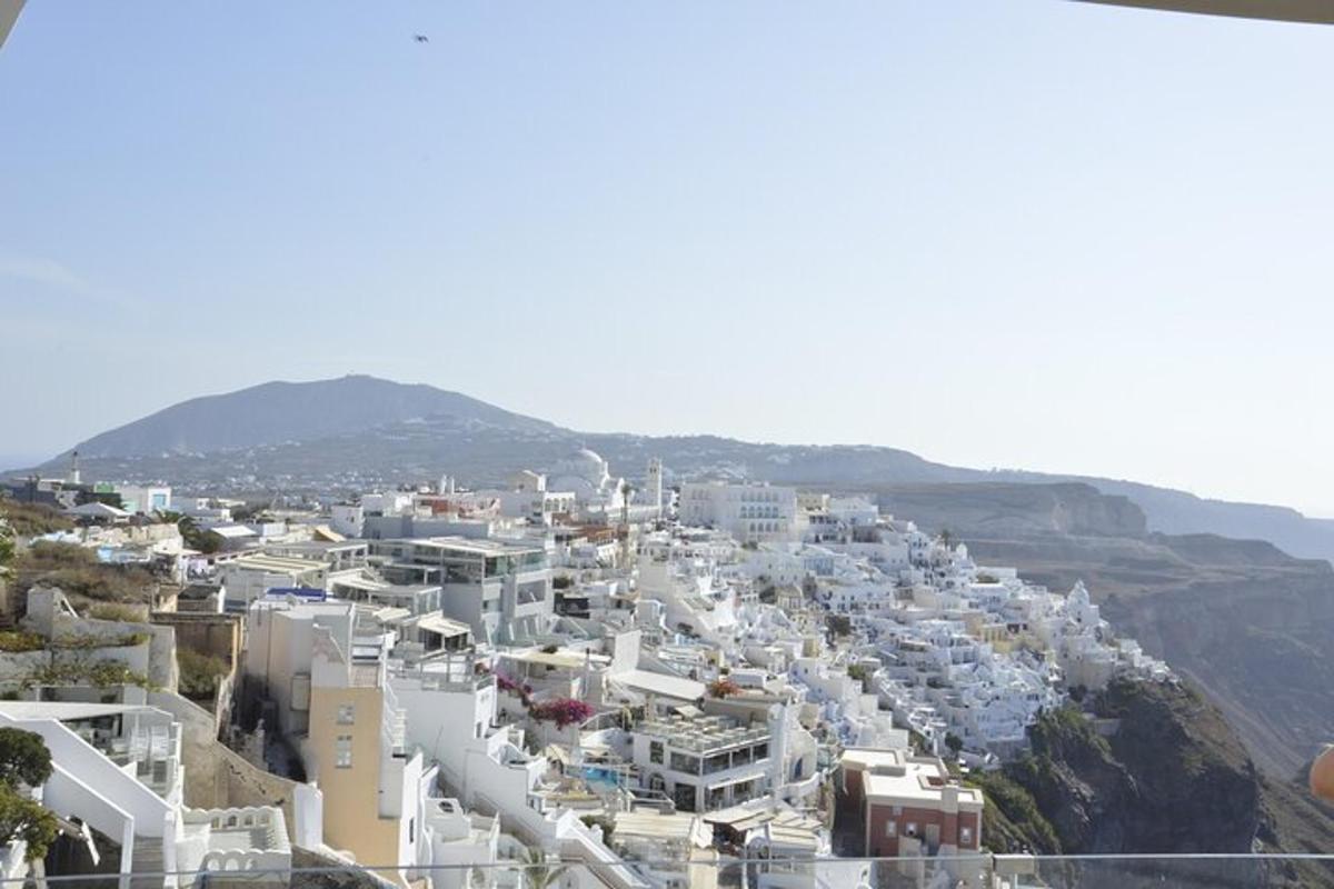 a view of a city with white buildings