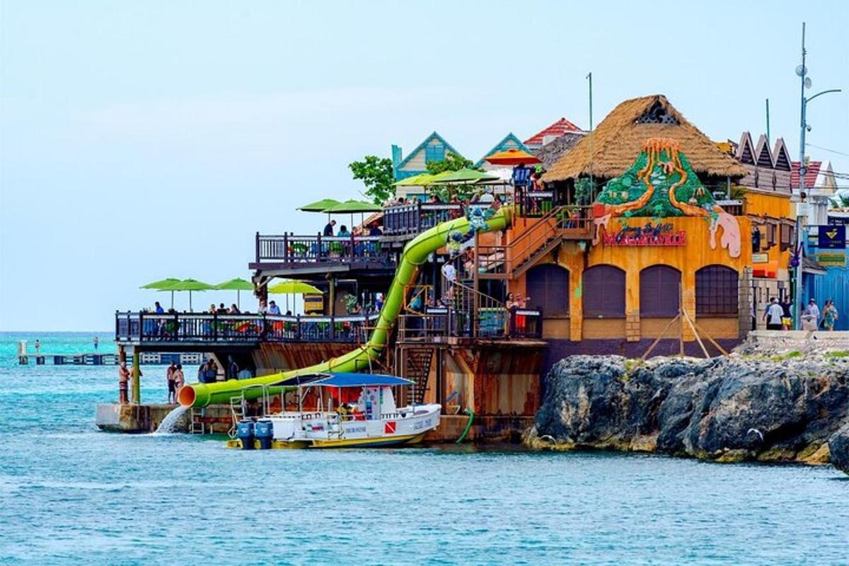 a water park with a slide in the water