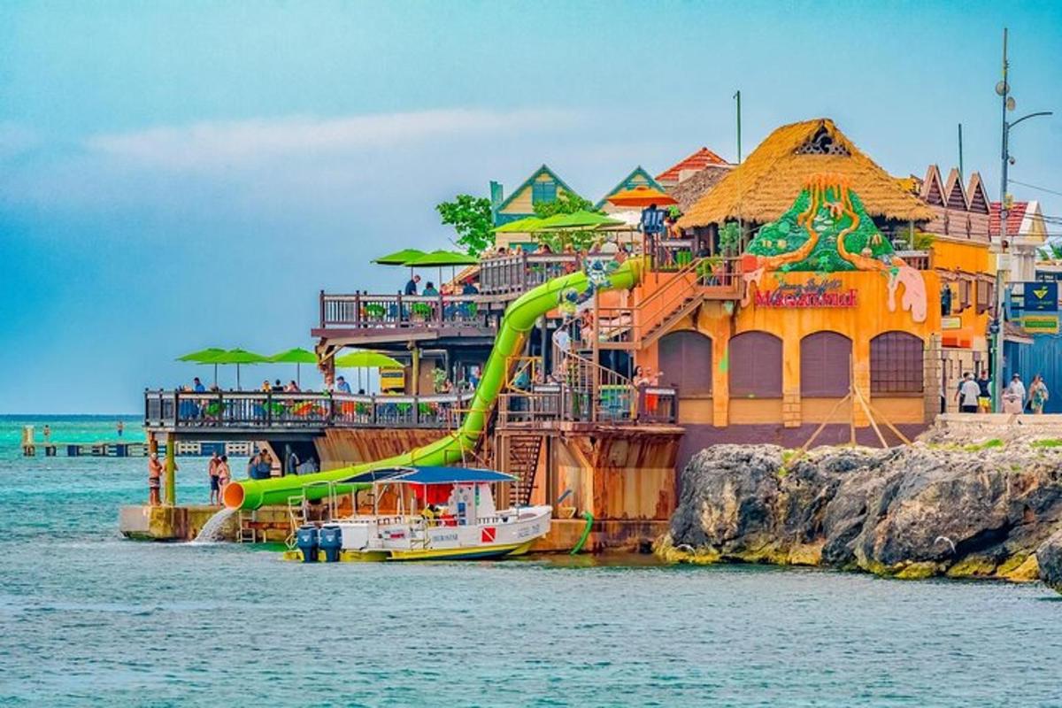 a water park with a slide in the water
