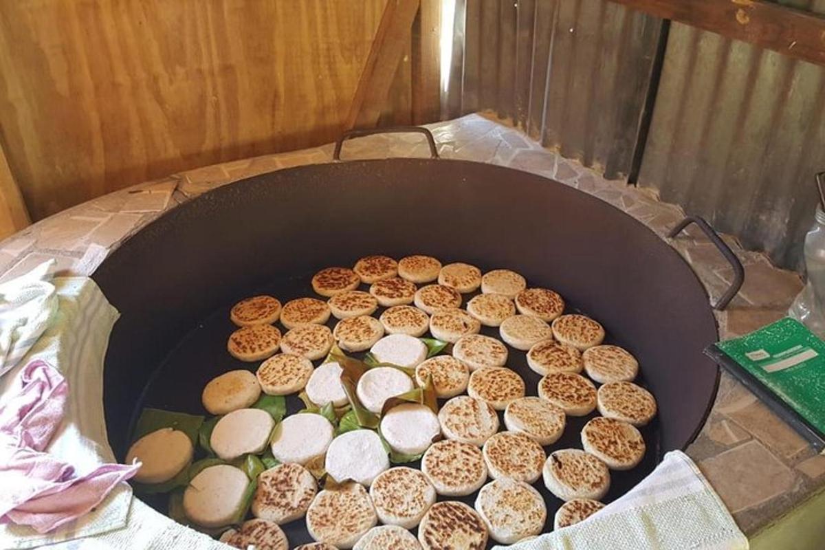 a bunch of donuts are cooking in an oven