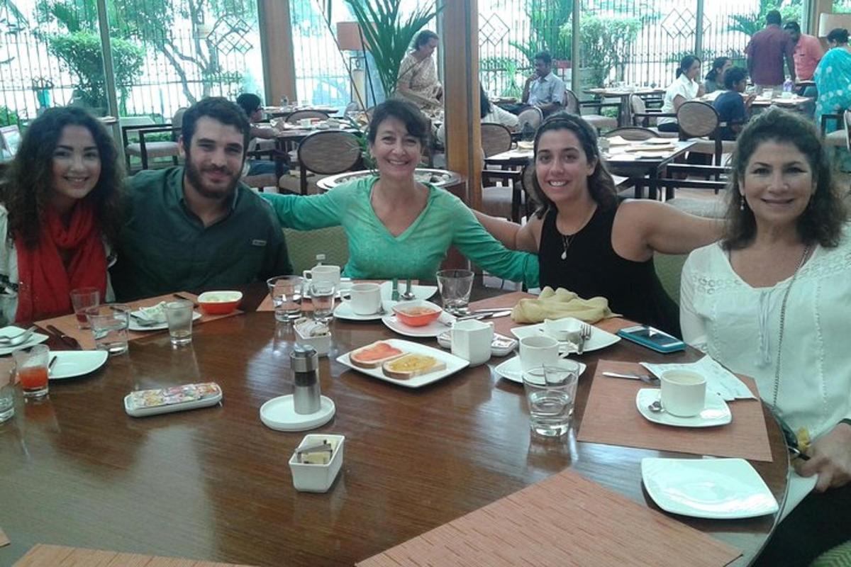a group of people sitting around a table