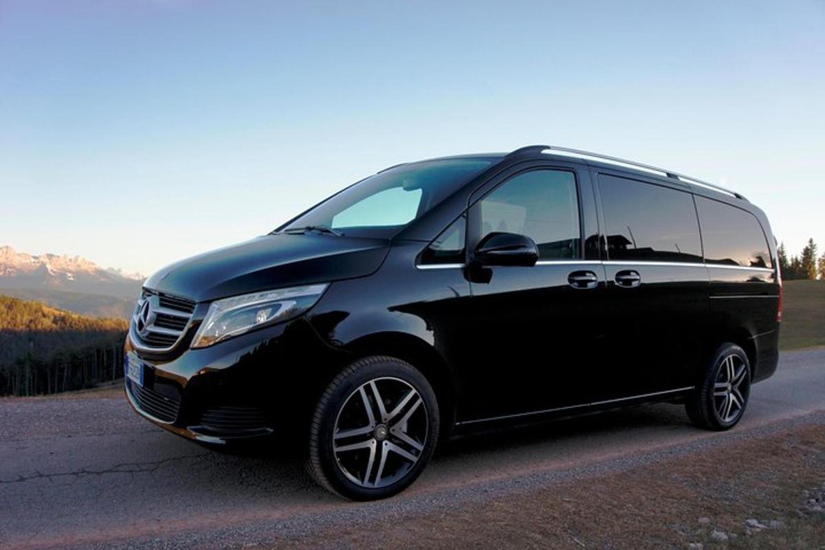 a black van parked on the side of a road