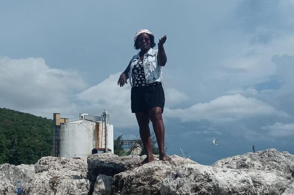 a man standing on top of a rock