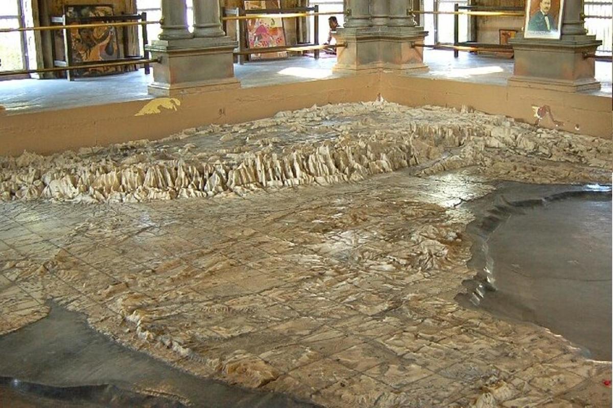 a stone floor in a building with a room with