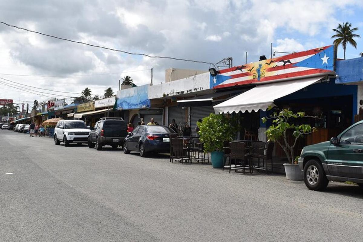 a street with cars parked on the side of the road