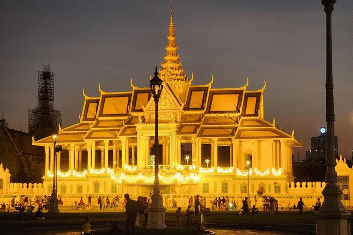 a large white building with a pagoda at night