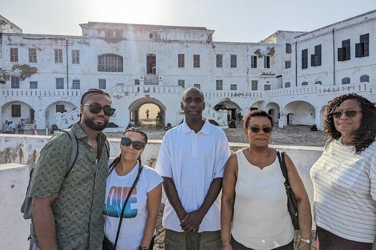 a group of people standing in front of a building