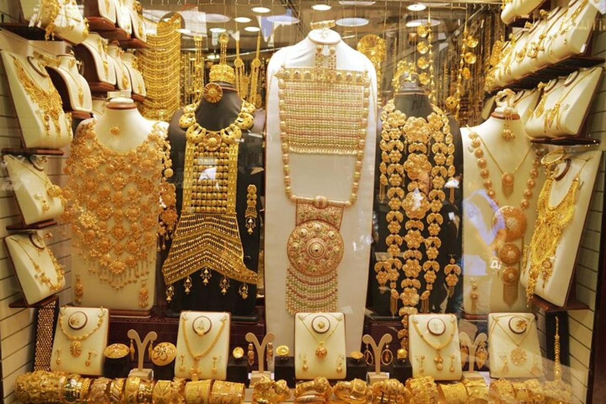 a display of gold jewelry in a store