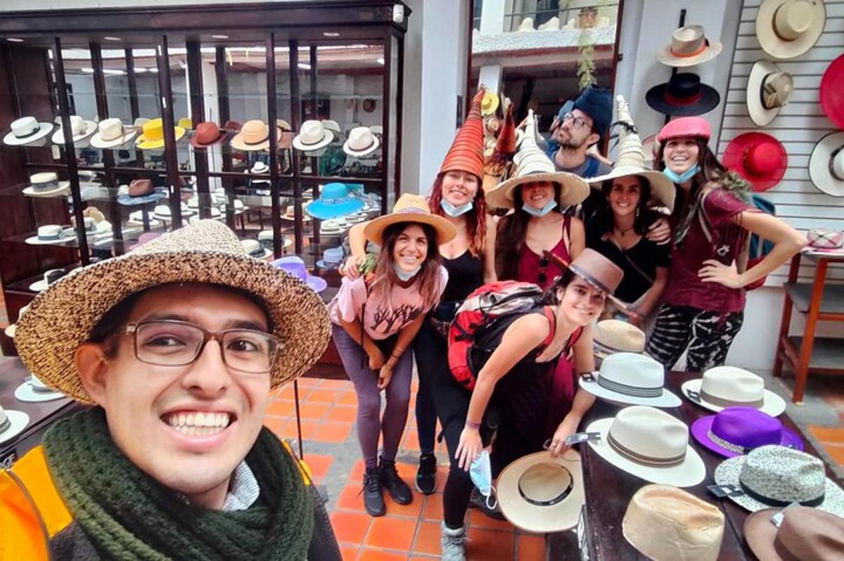 a group of people in hats posing for a picture
