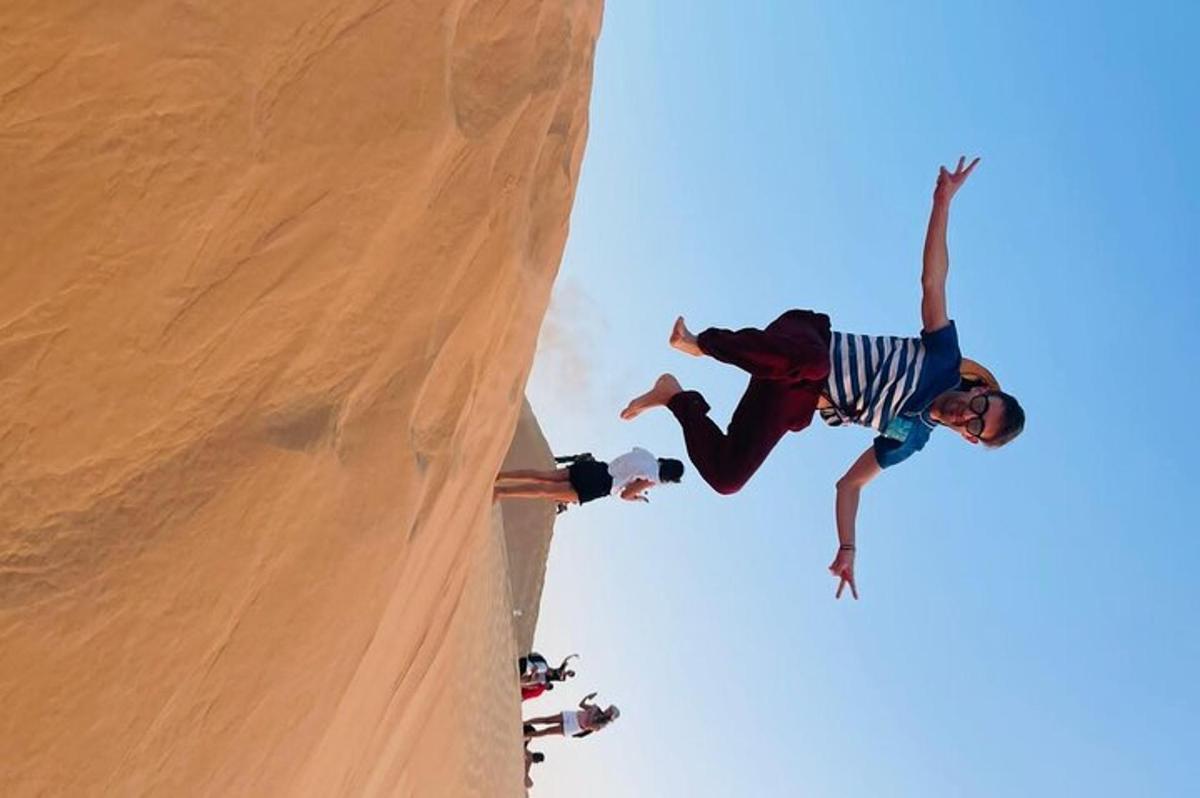 a man is jumping off of a halfpipe