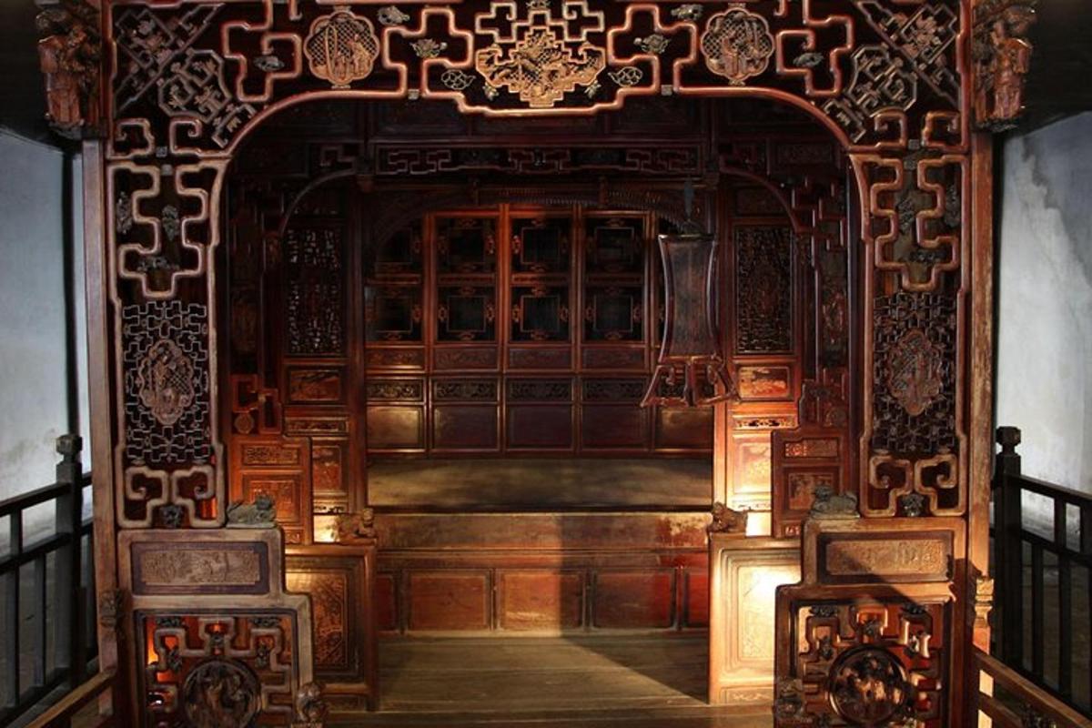 an entrance to a building with a large wooden door