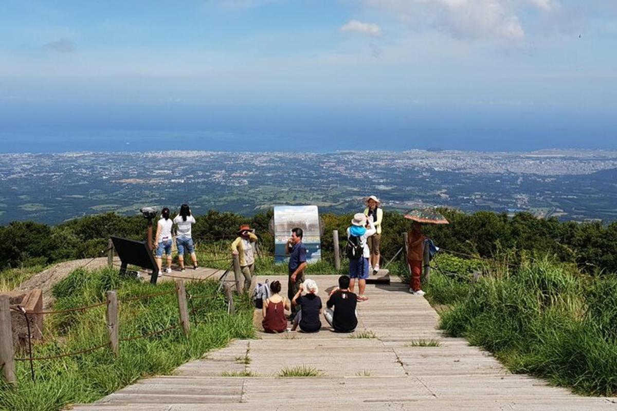 a group of people sitting on a path
