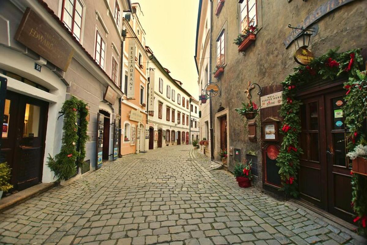 an empty street in an old town with buildings