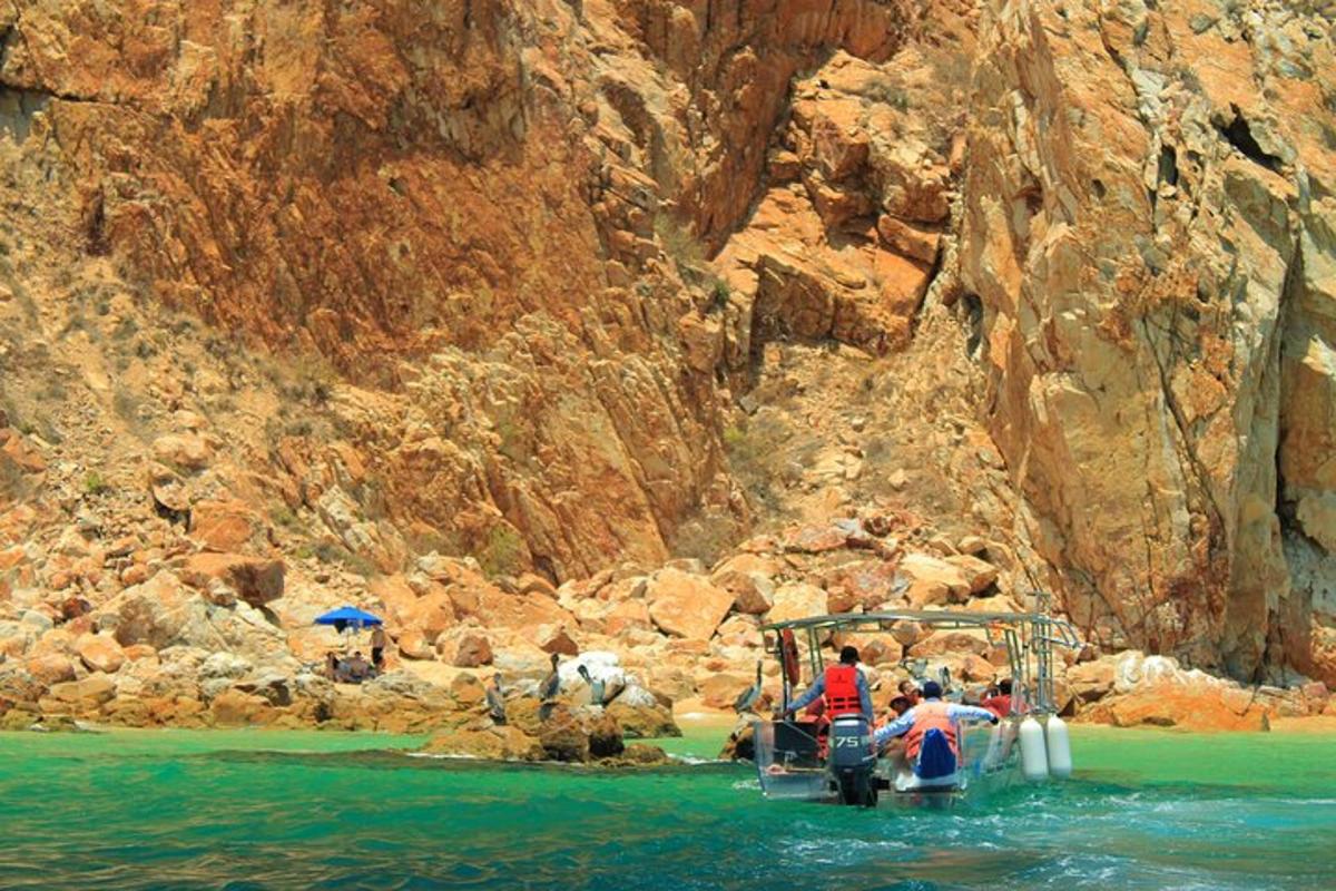 a group of people on a boat in the water