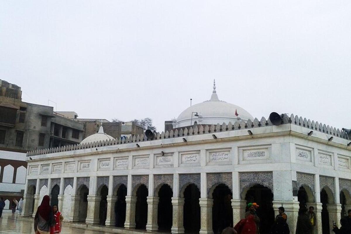 a large white building with a domed roof