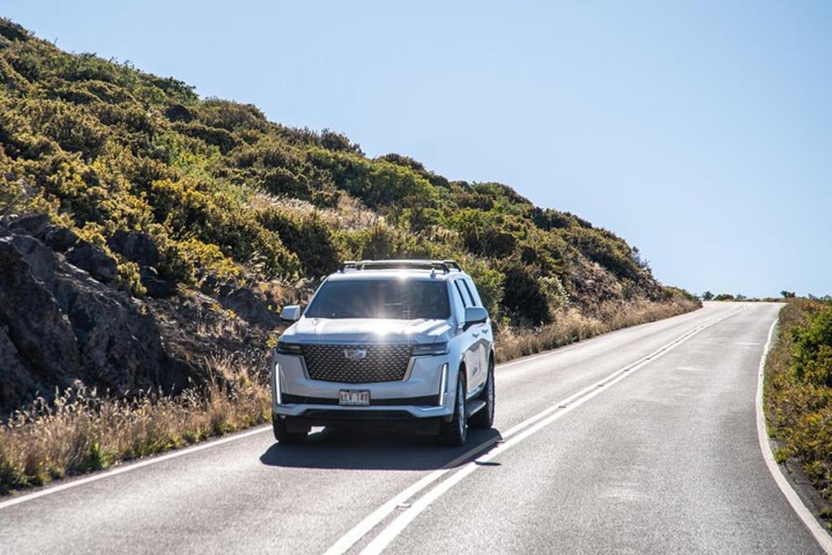 a self driving car driving down a road