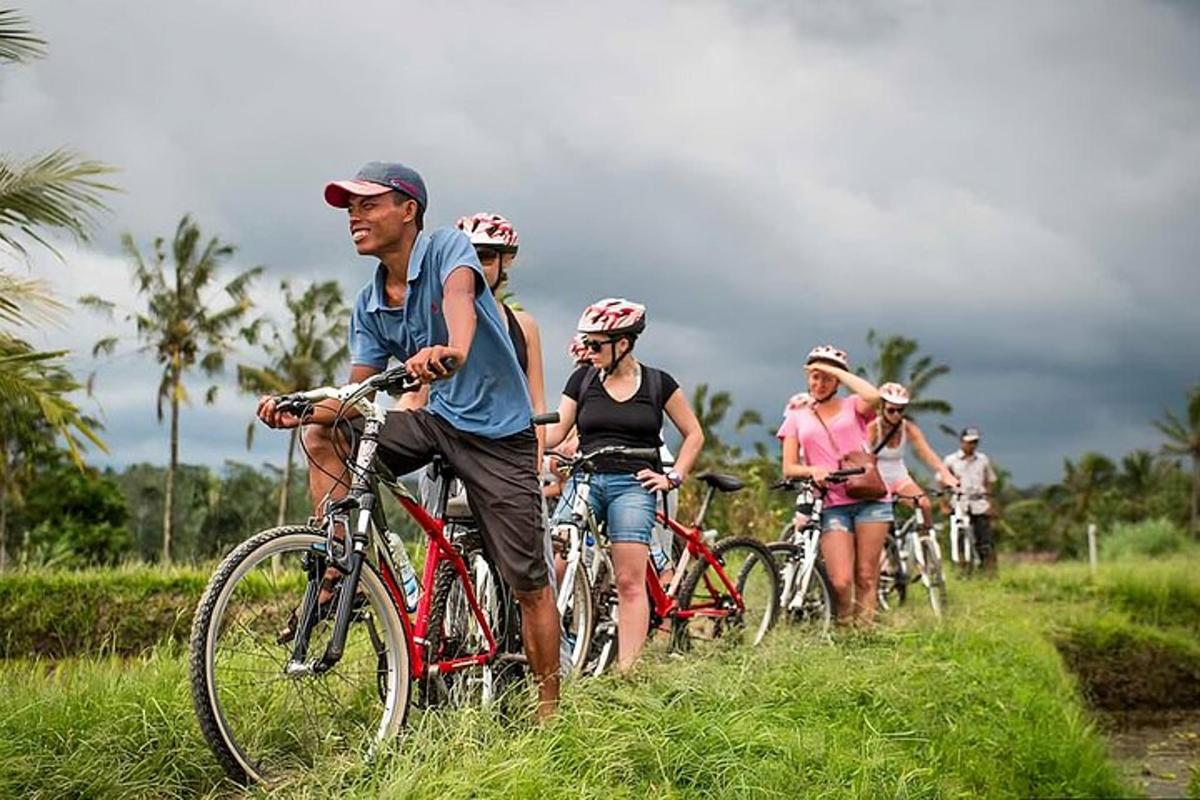 a group of people riding bikes on a trail