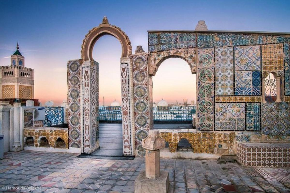 a building with two arches and a mosque