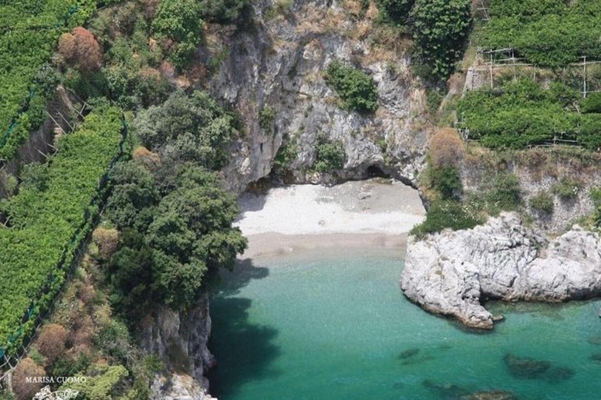 an aerial view of a beach in a mountain