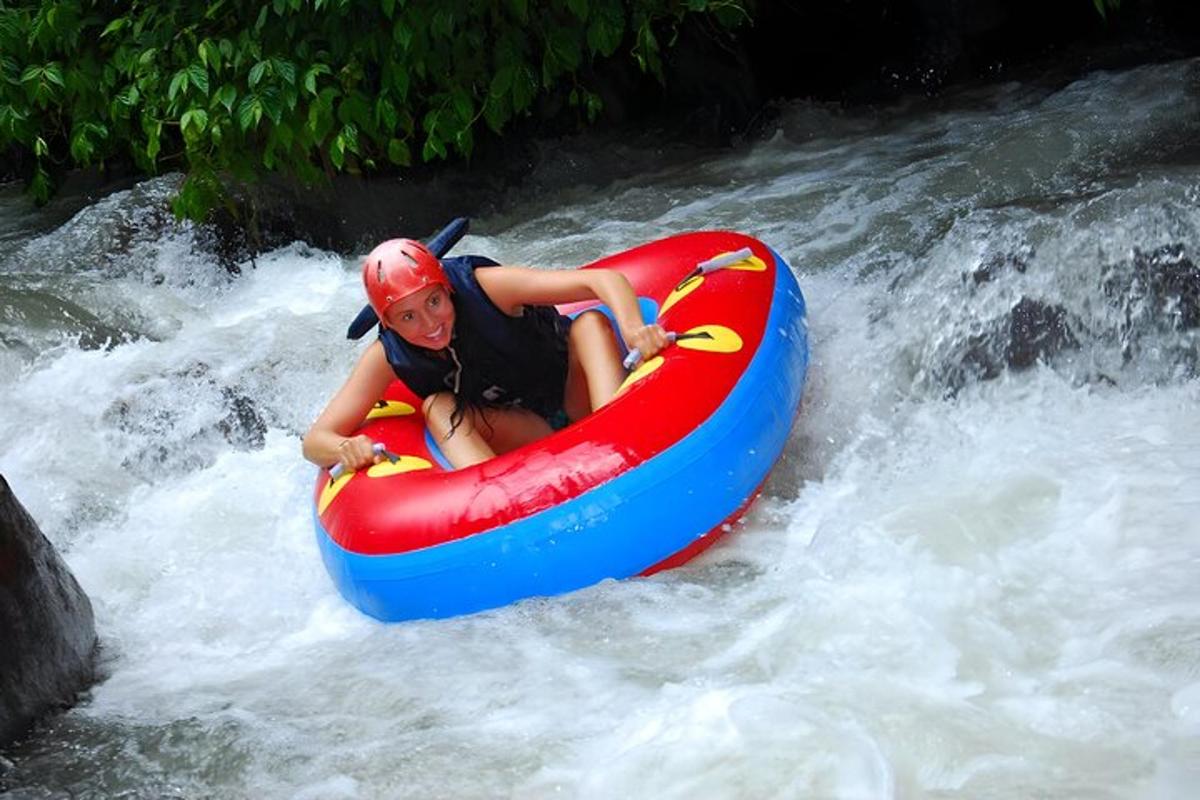 a person in a raft in a river