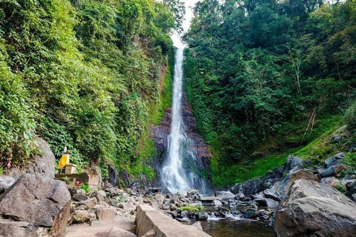 a waterfall in the middle of a river