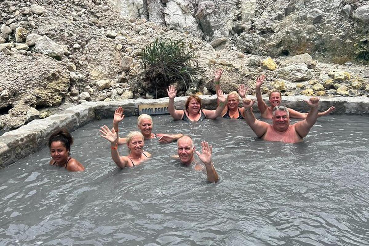 a group of people swimming in the water