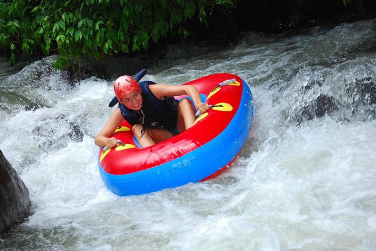 a person in a raft in a river