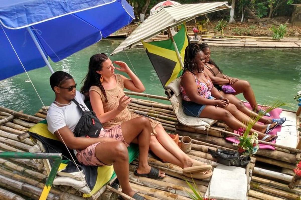 a group of people sitting on a raft in the water