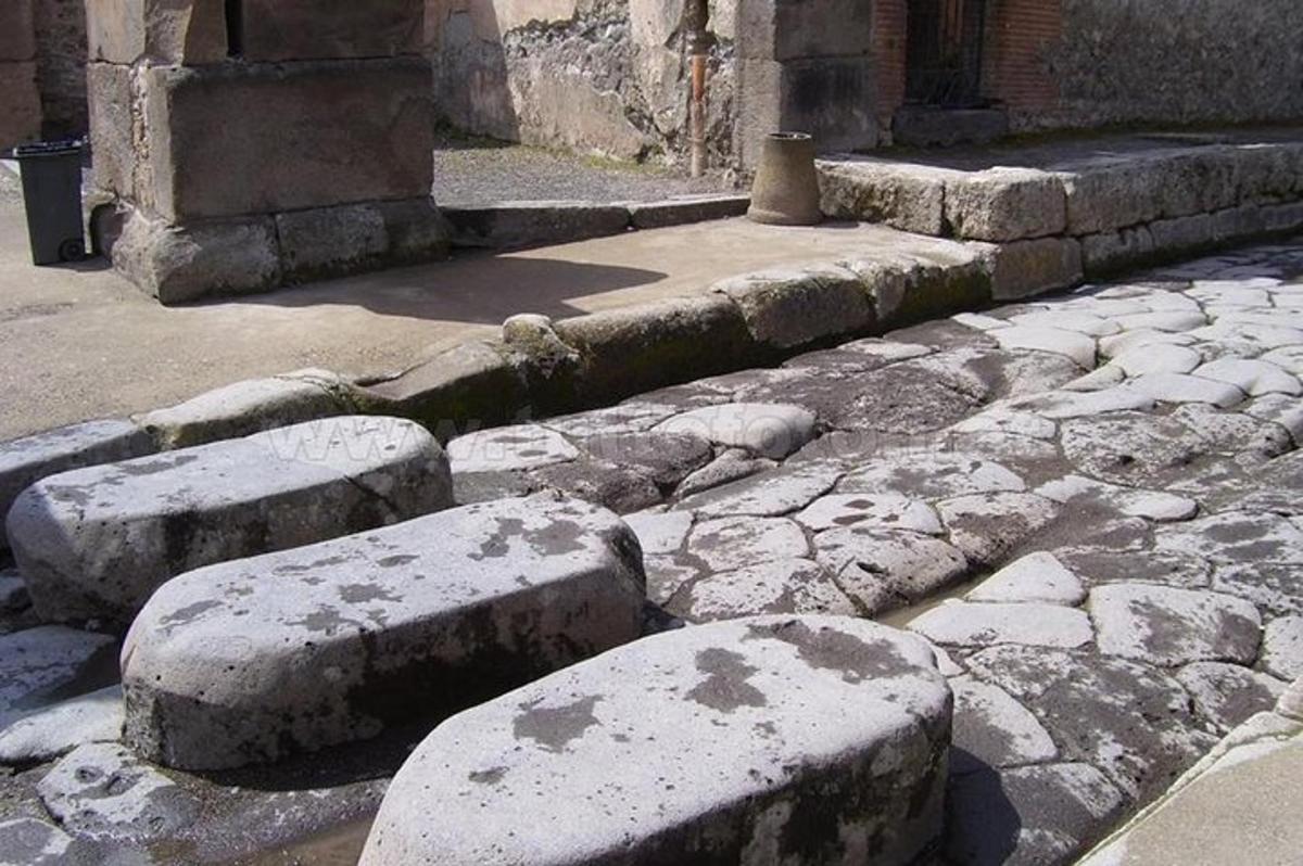 a group of stone steps in front of a building