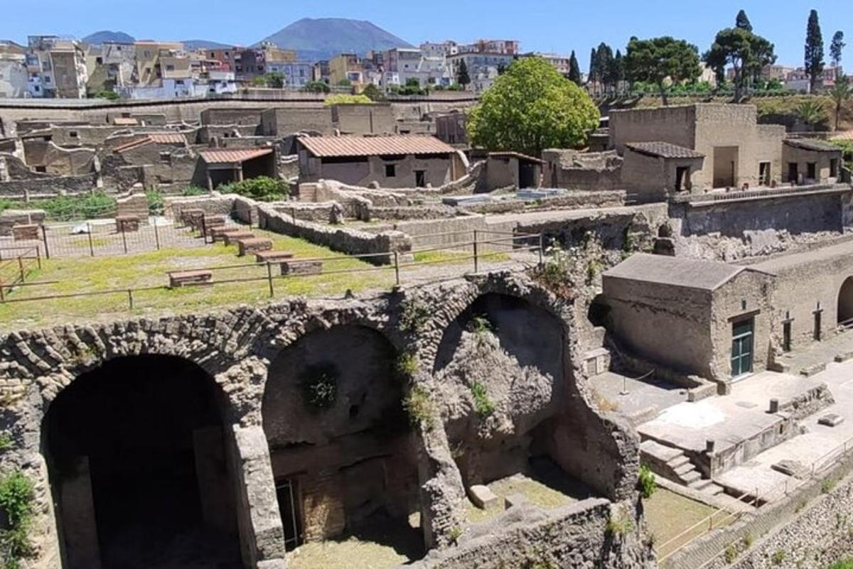 an ancient city with a bridge and buildings