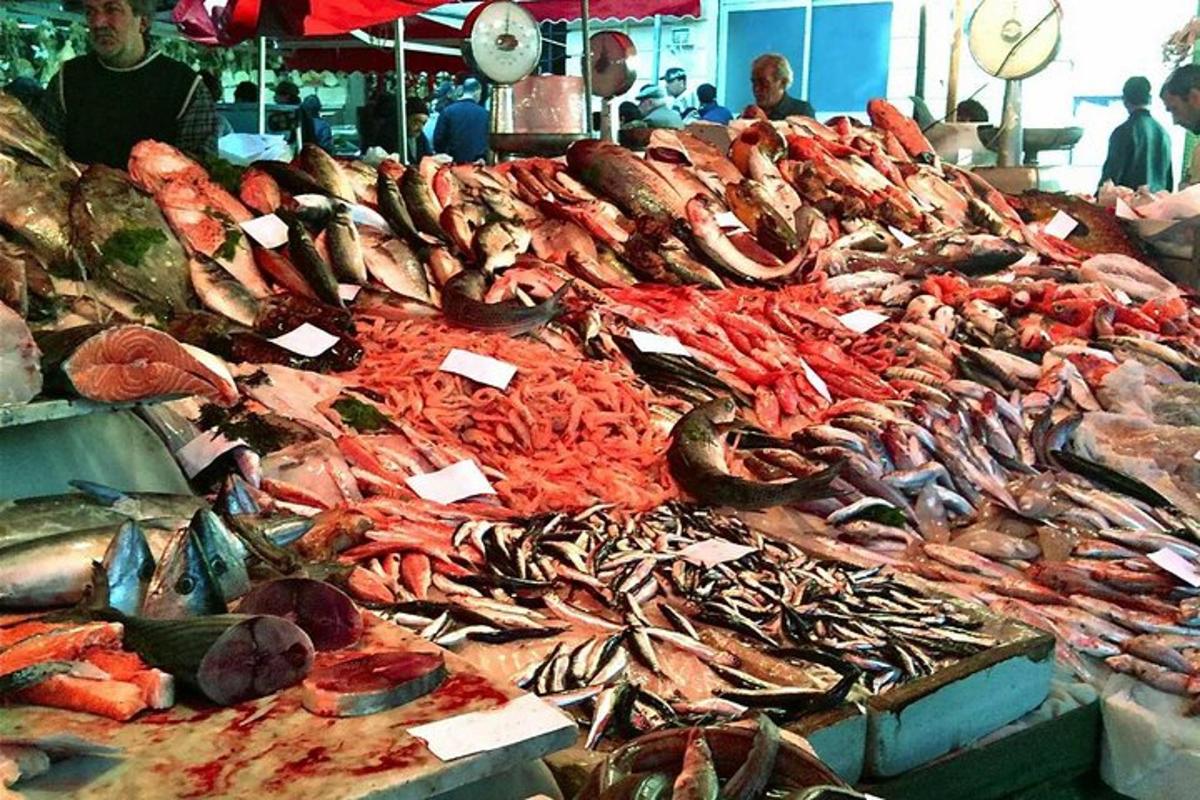 a bunch of fish on display at a market