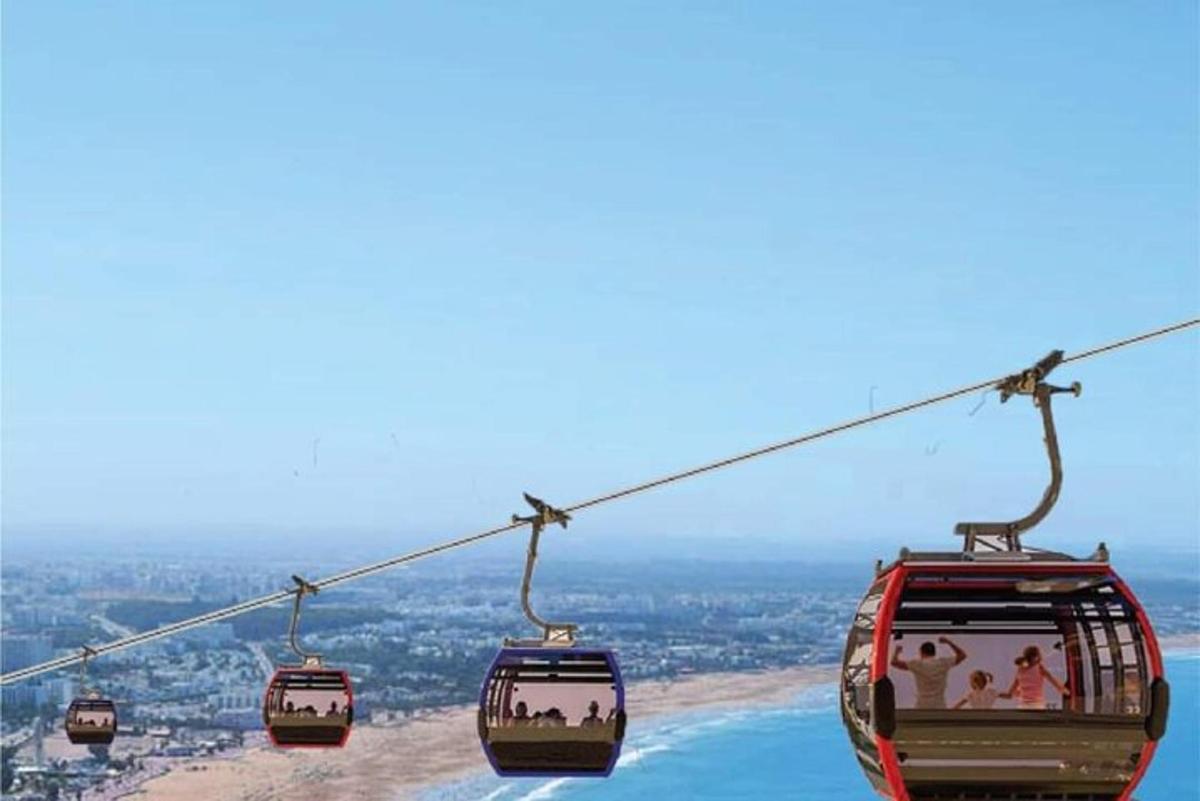 a group of gondolas on a cable car