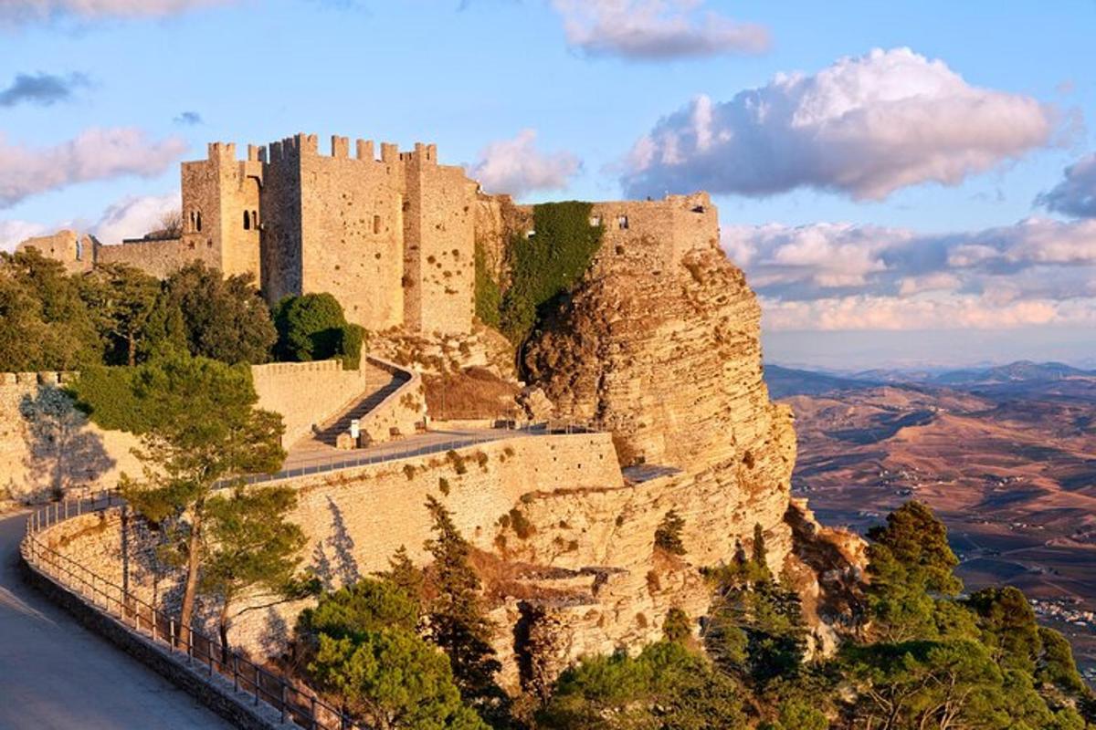 a castle on the side of a mountain