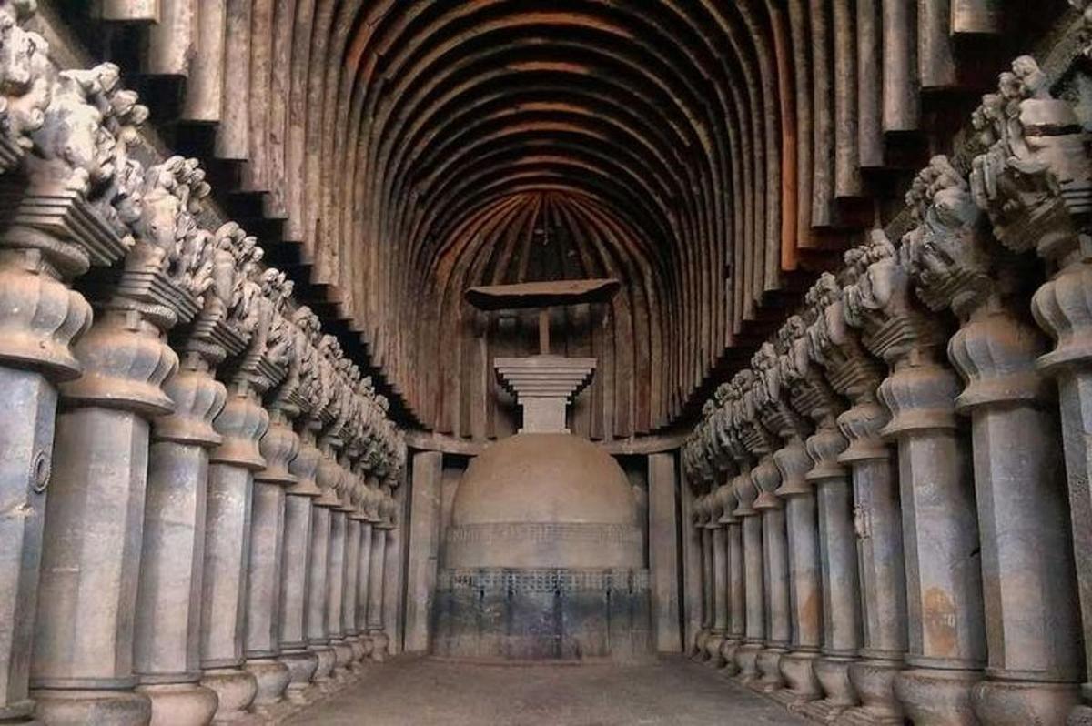 a hallway in a building with a vaulted ceiling