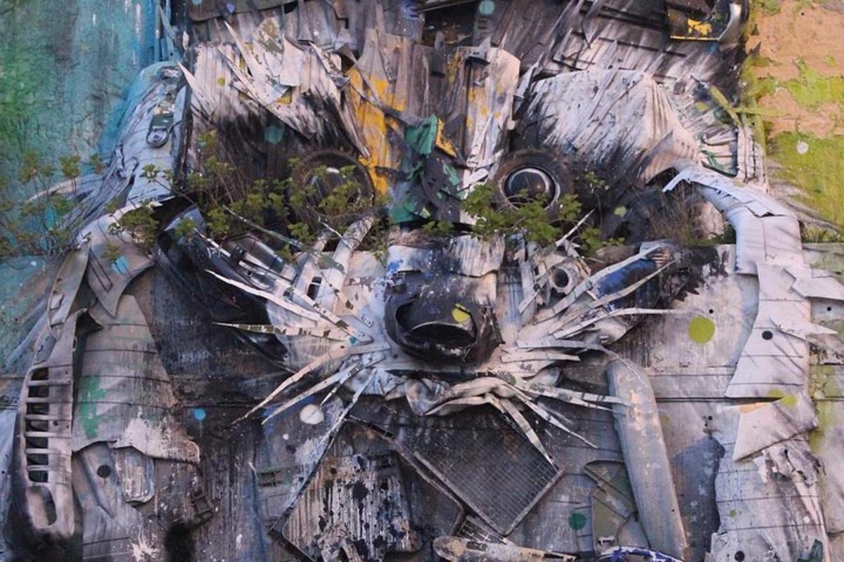 a pile of scrap metal on a wall