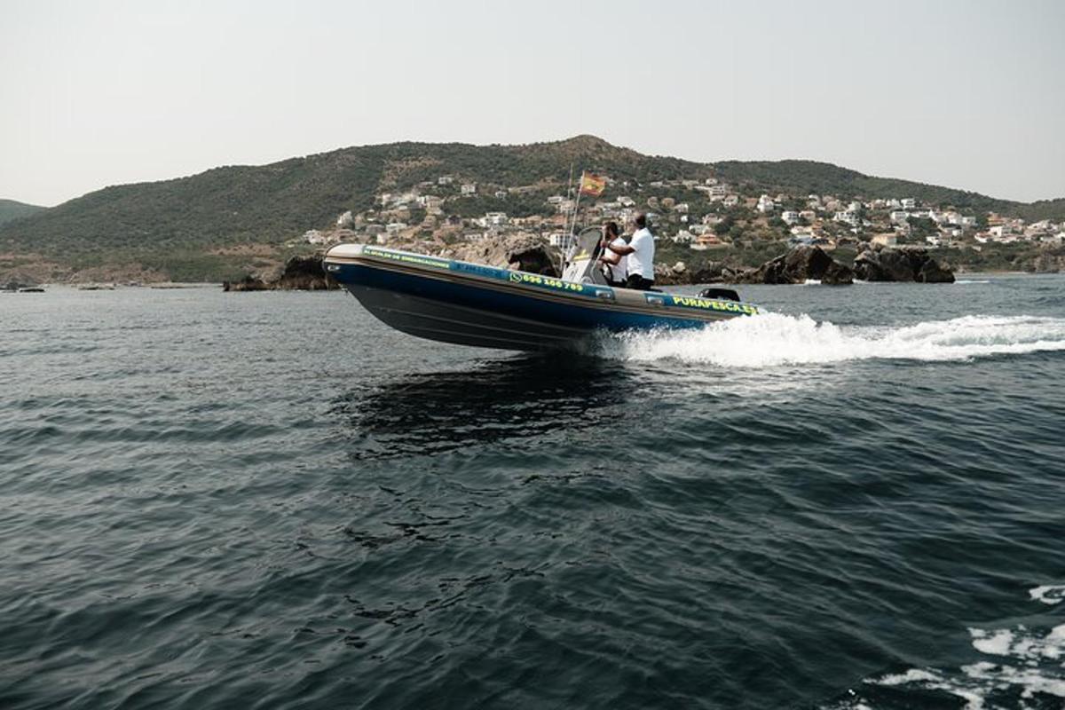 a group of people on a boat in the water