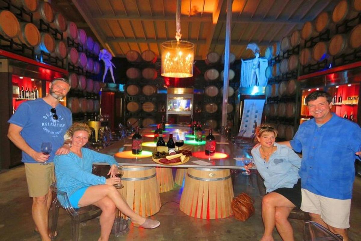 a group of people sitting at a bar