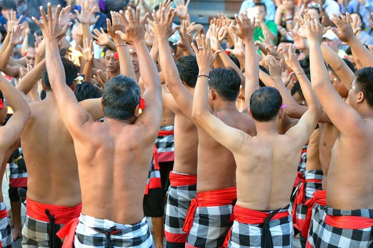 um grupo de homens com as mãos no ar