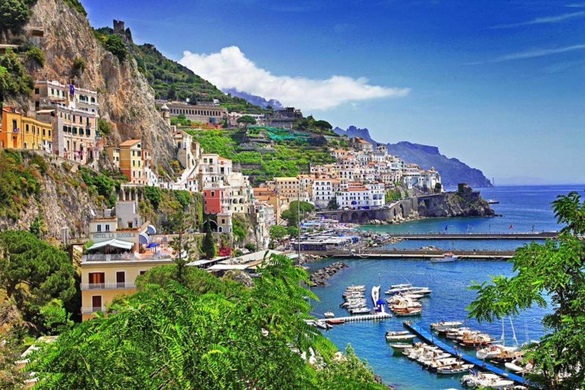 a view of a harbor with boats in the water