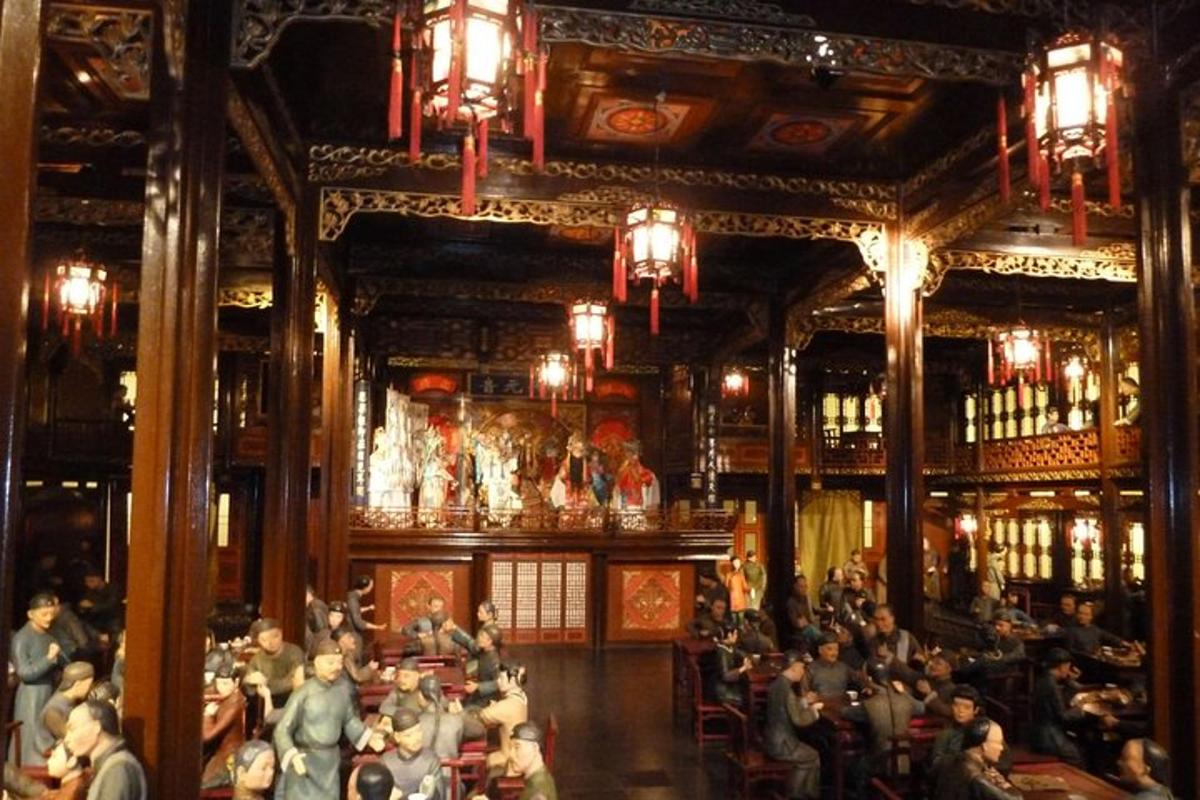 a large crowd of people sitting in a large building