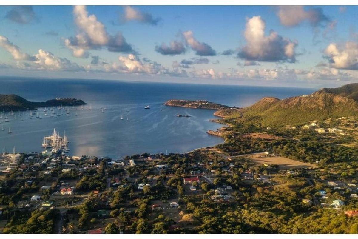 an aerial view of a bay with boats in the water