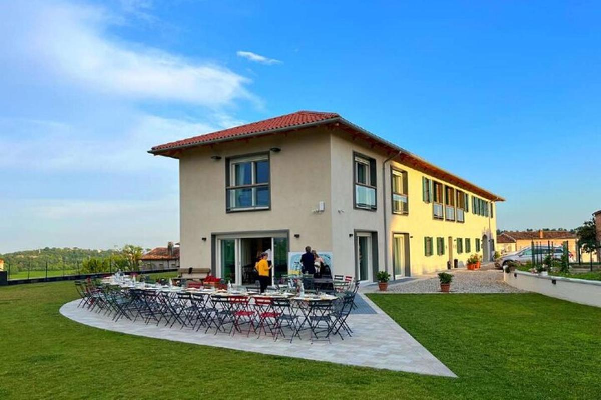 a building with a table and chairs in front of it