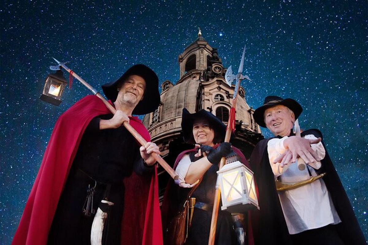 a group of people dressed in costumes standing in front of a building