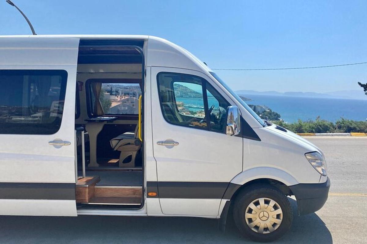 a white van with its door open on a street
