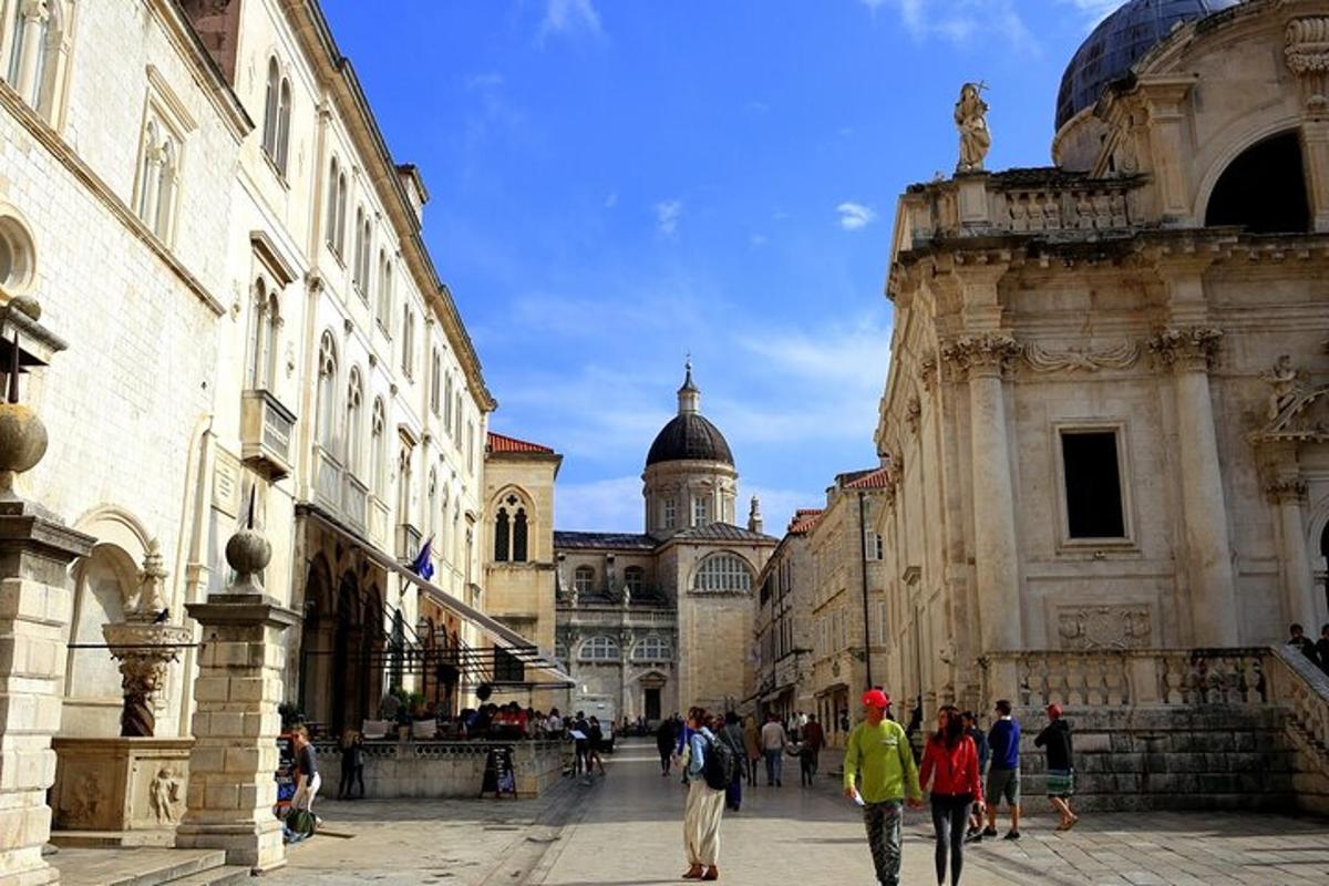 a group of people walking down a street