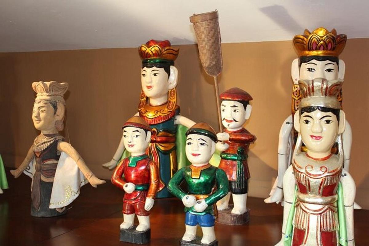 a group of figurines of a family on a table