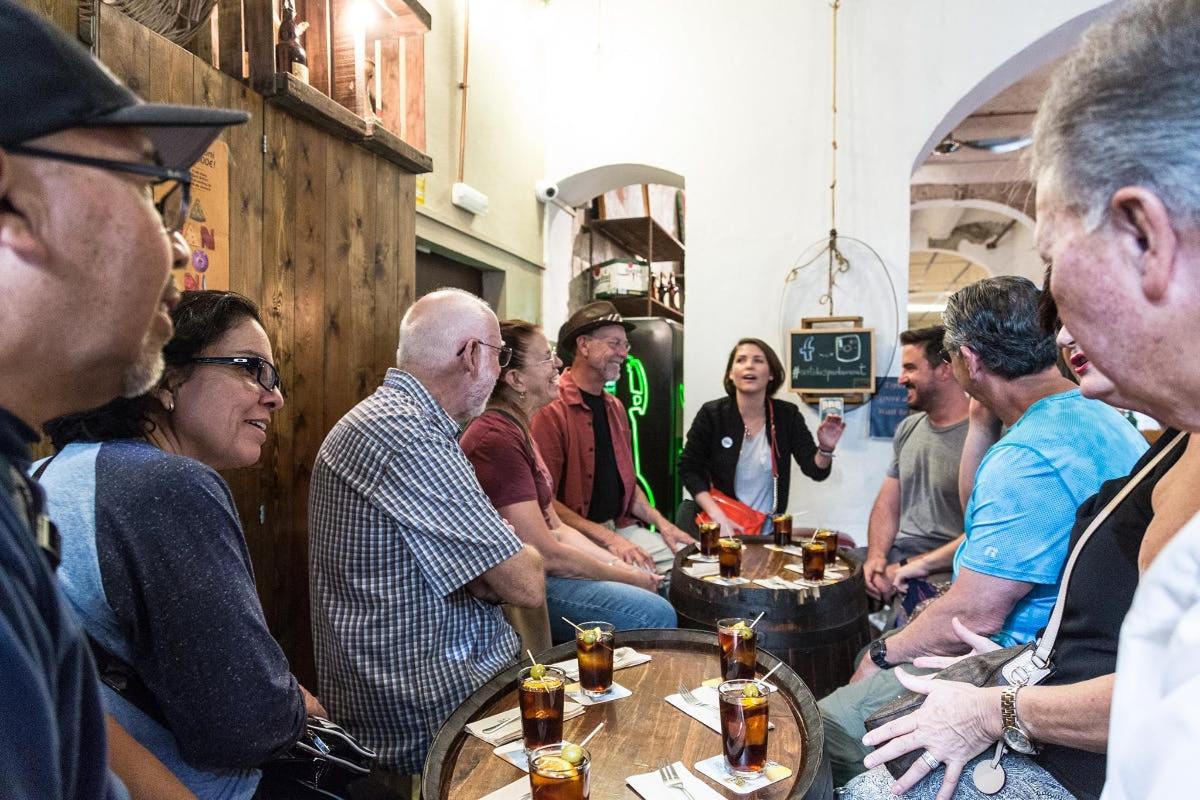 a group of people sitting at tables in a room