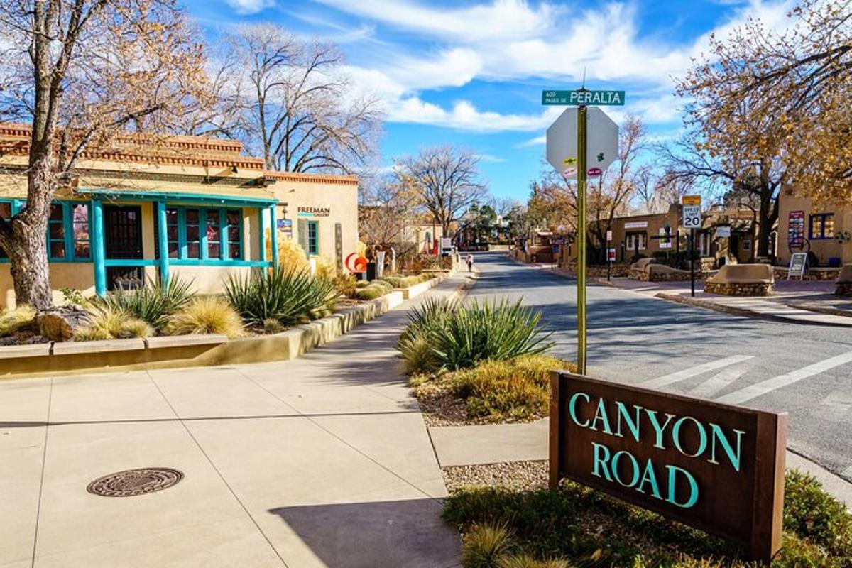 a sign that says canyon road on a street