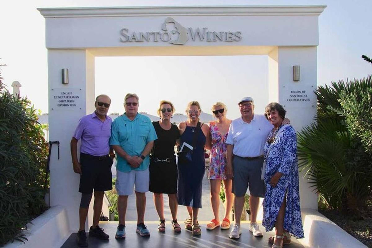 a group of people standing in front of a building