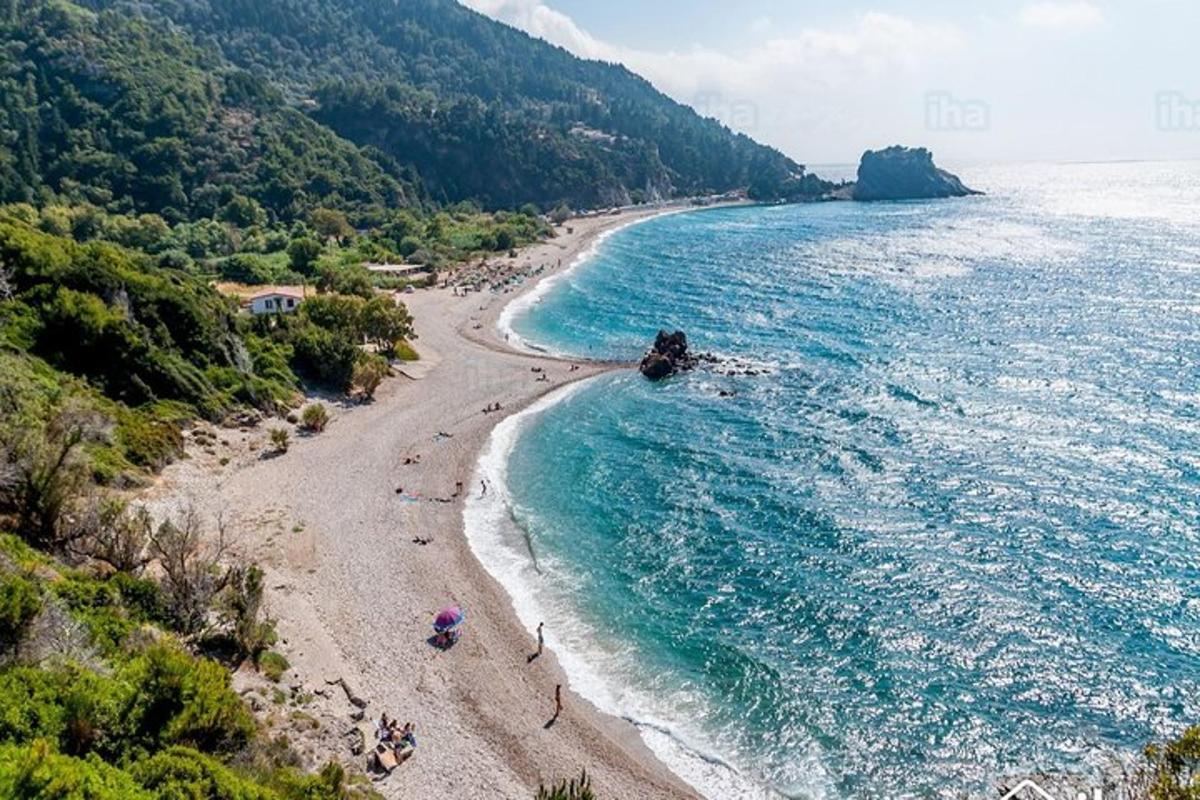 an aerial view of a beach with people on it